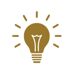 image of a lit gold lightbulb
